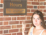 Woman looking disappointed at library closed&mdash;courtesy of Freedom Goliath Impermanence